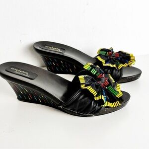 Rare Umberto Bianchi wedge with colorful details throughout. Bow front on toe